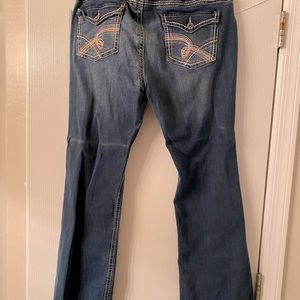 Blue maternity jeans with blue full belly cover